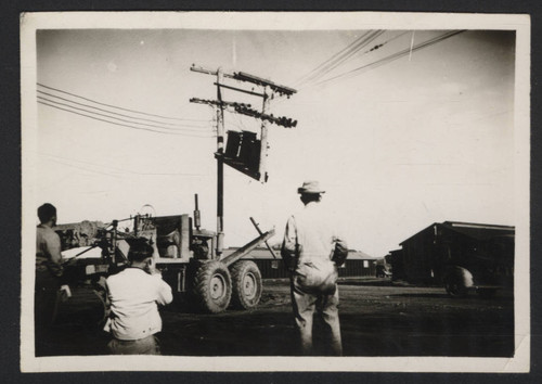 Installing electrical wires at Tule Lake