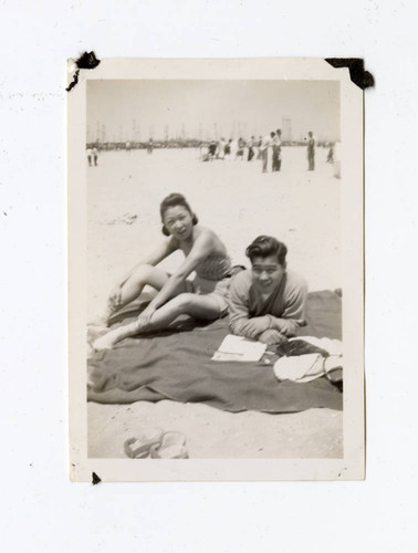 Young man and woman at the beach