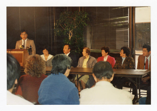 Aki Maehara speaking at press conference