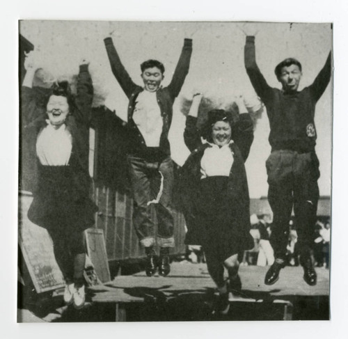 Copy of a photograph of a group jumping