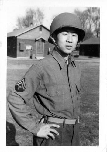 [Toshikuni Taenaka in US Army combat uniform]