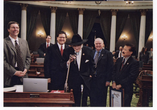 George Nakano and Ralph C. Dills with other in assemby chamber