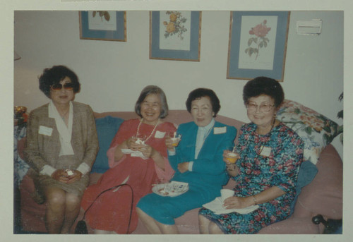 Four women at Kay and Khan Komai's 50th wedding anniversary party