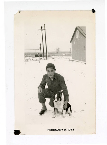 Young man in uniform in the snow at Granada camp