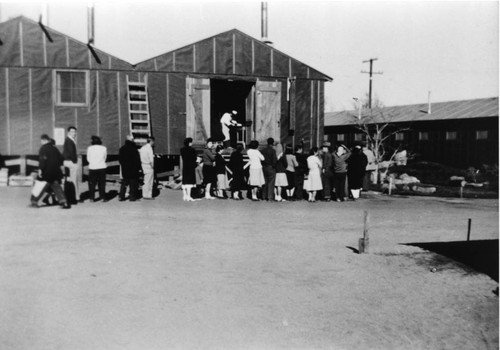 [Children's Village incarcerees wait at mess hall]