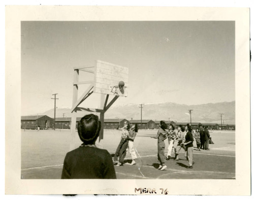 Photograph of girls playing basketball at Manzanar
