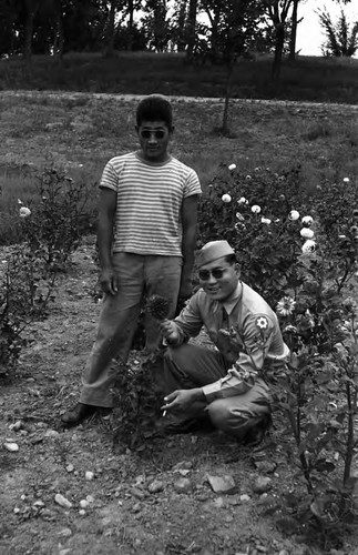 Takashi Ishida and man in military uniform