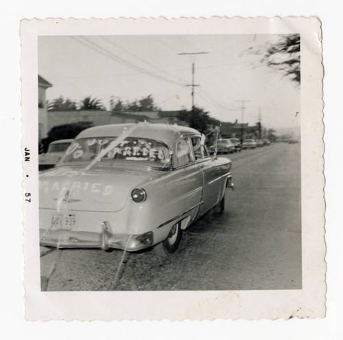 Florence Sumire and Robert Griffen driving way from wedding