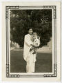 Kiyoko Maeda Yoshioka holding a friend's baby on New Year's Day