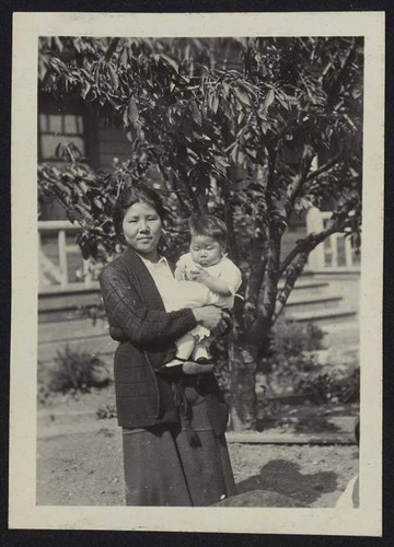 Woman holding a baby