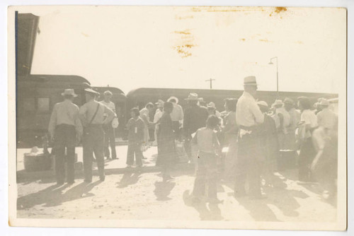 People at train station