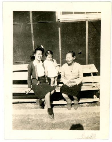 Aiko Herzig Yoshinaga and Shigeru Yoshinaga with baby girl at incarceration camp