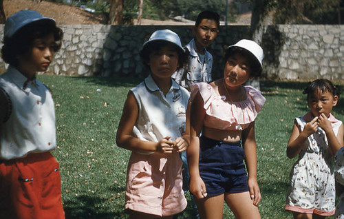 Girls and young man at Little Miss picnic