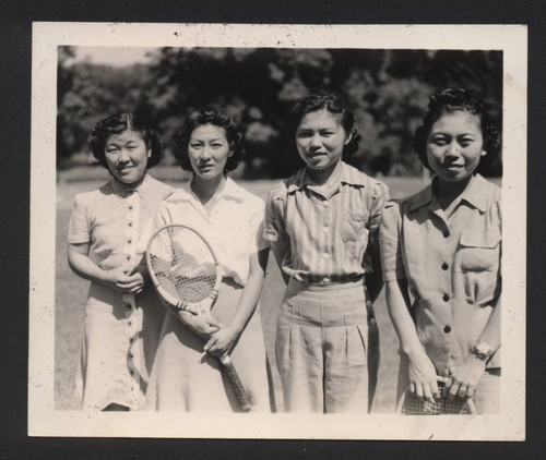 Tsugi and Megumi Hamada with two women holding tennis rackets