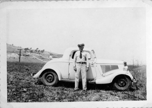 Man in Uniform with Vehicle