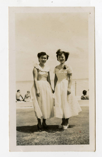 Betty Takamori standing next to a woman