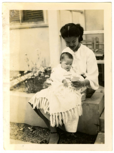 Aiko Herzig Yoshinaga holding Lisa Jo Furutani