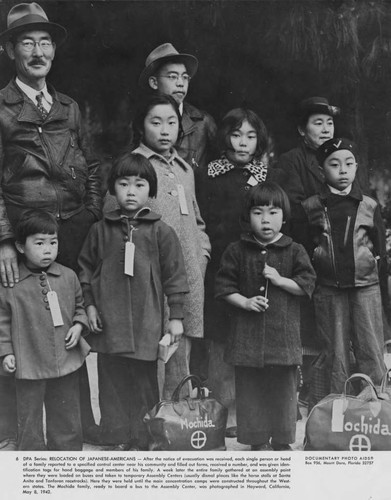 Mochida family ready to board a bus to an assembly center