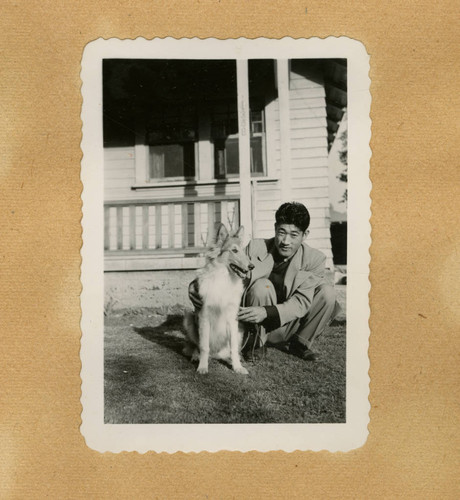 Takashi Ishida with a dog