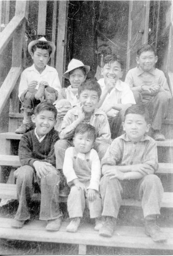 [Children on barrack steps of Children's Village]