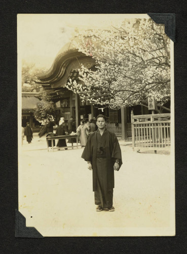 Man standing in front of building