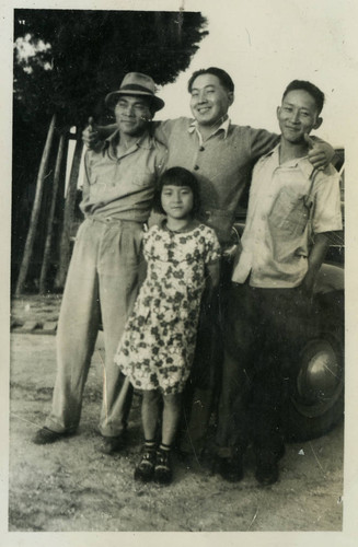 [Photograph of the Okine family]