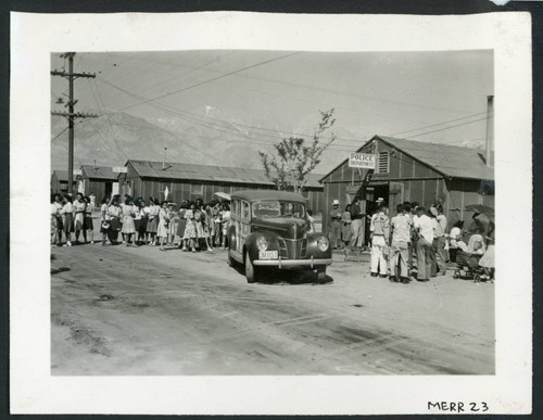 Departure by WRA escort in station wagon en route to Reno