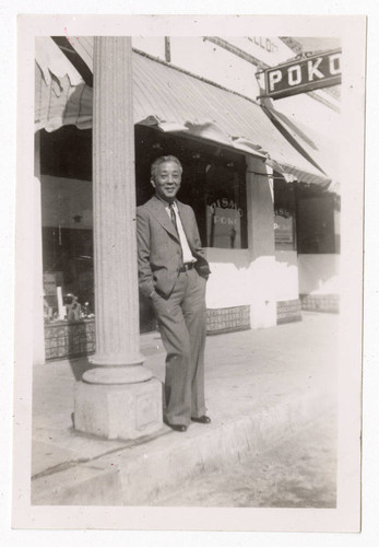 Man standing outside of Pismo Poko