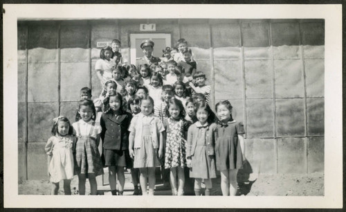 Group of children with Ben Kuroki