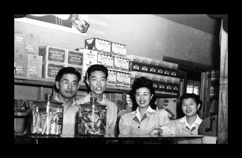 M. Sugihara, H. Uyeda, and N. Kawashima at the canteen, Amache Co-op