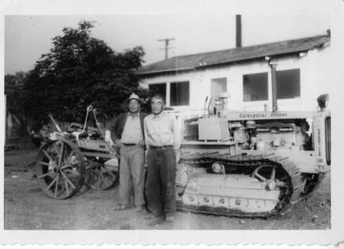 Kumekichi and Tomizo Ishibashi with Tractor