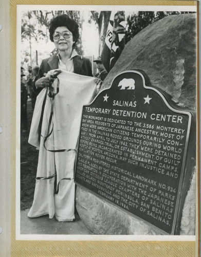 [Violet Kazue de Cristoforo unveiling the Salinas Assembly Center plaque]