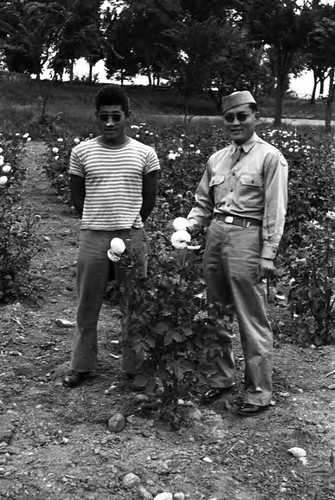 Takashi Ishida with man in military uniform