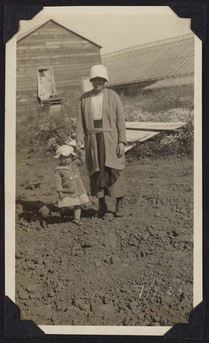 Woman and child on farm