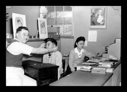 Dr. E.R. Kuwahara and Shizu Fukuyama in the Optical Department, Amache Co-op