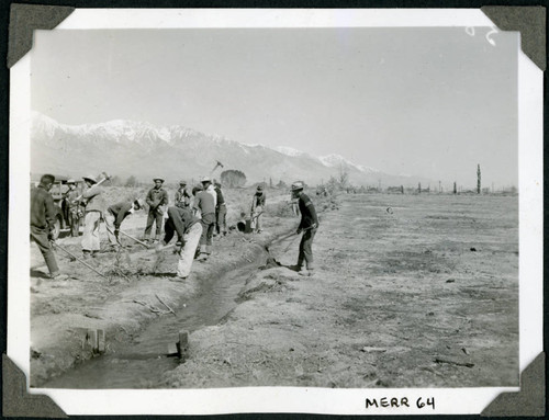 Volunteers dig ditches