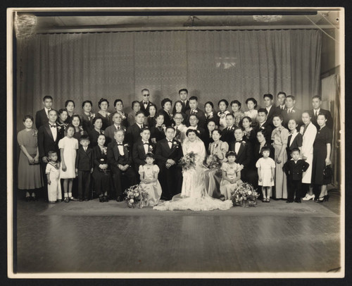 Wedding photograph with bride and groom