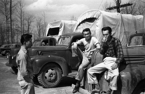 Men with trucks in Jerome camp