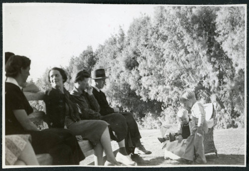 Photograph of five adults and two children in Death Valley