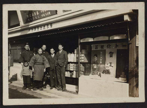 Men in front of store