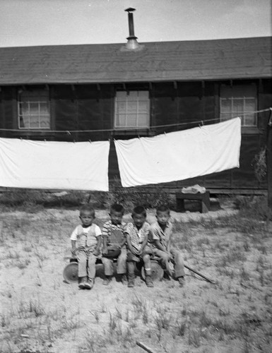 Children with clothesline in Jerome camp