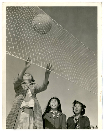 Photograph of a girls volleyball game at Manzanar