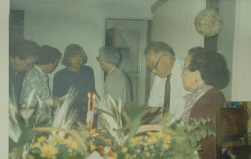 Men and woman at 50th anniversary party