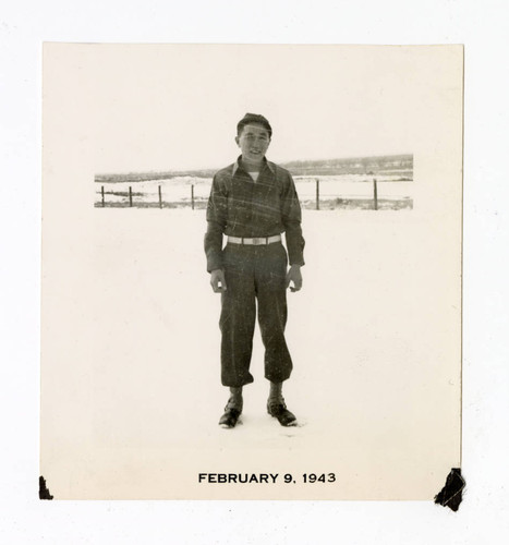 Young man in uniform in the snow at Granada camp