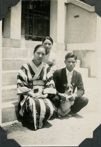 [Yaeko and family with dog]