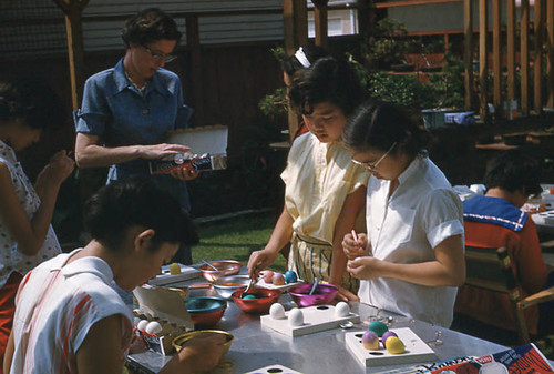 Girls dying eggs at Little Miss event