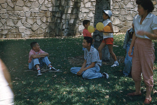 Young children and woman at Little Miss picnic