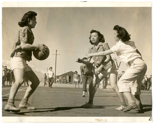 Photograph of a girls basketball game at Manzanar on February 13, 1943