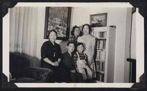 Group posing in living room