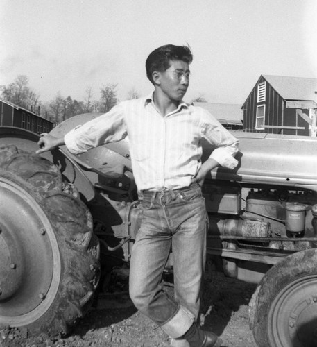 Atsushi Art Ishida with tractor in Jerome